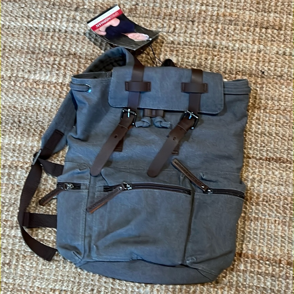 Greg Norman canvas and leather backpack new with tags